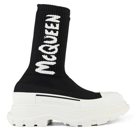 Women's McQueen Graffiti Knit Tread Slick Boot in Black/white