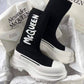 Women's McQueen Graffiti Knit Tread Slick Boot in Black/white