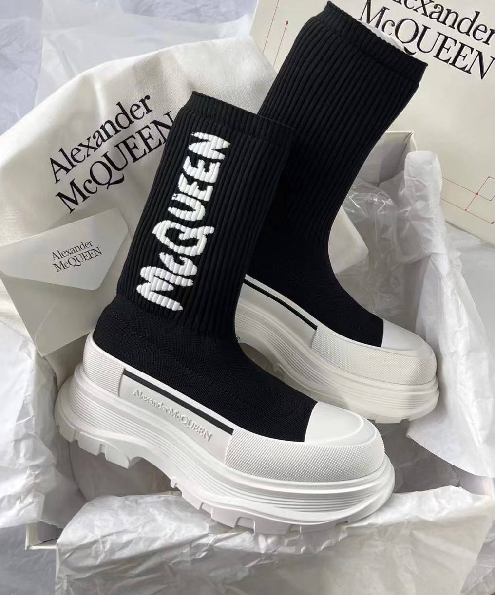 Women's McQueen Graffiti Knit Tread Slick Boot in Black/white